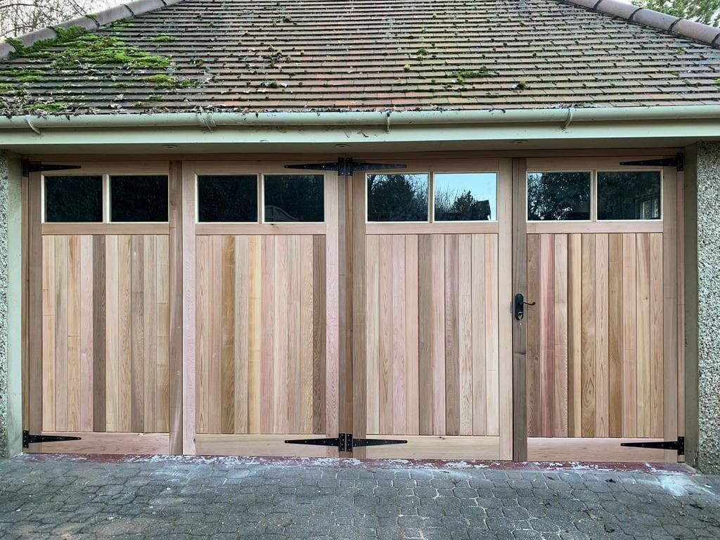 Cedar garage doors with glazed upper panels
